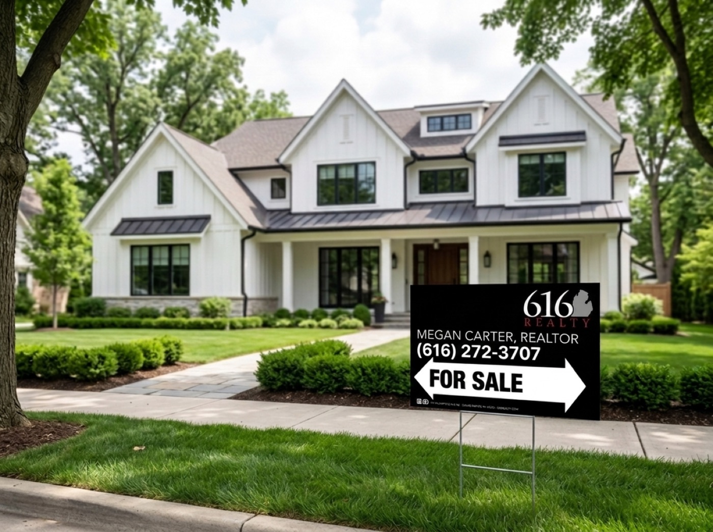 616 Realty For Sale yard sign in front of a modern farmhouse Michigan home